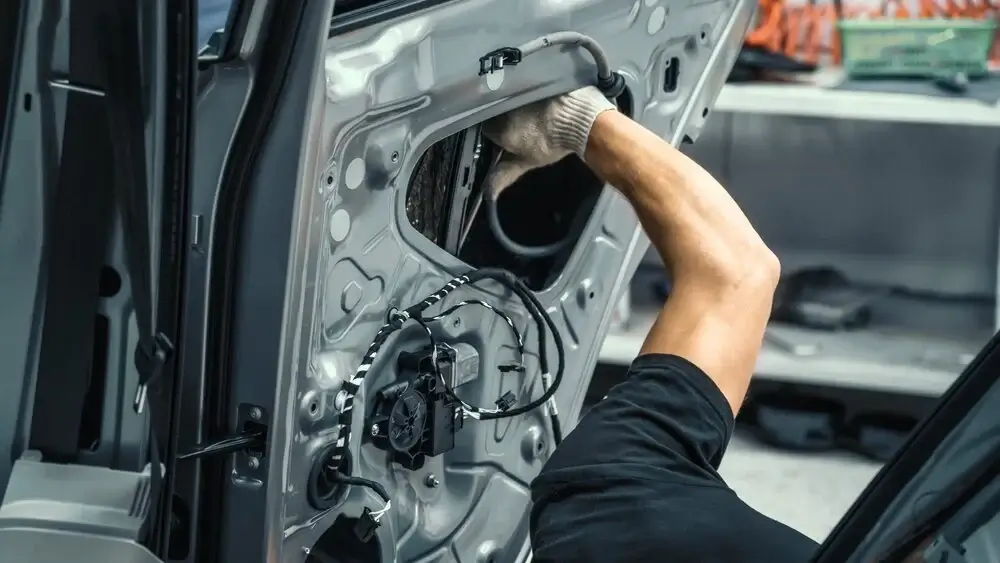 Car with door panels removed for installation